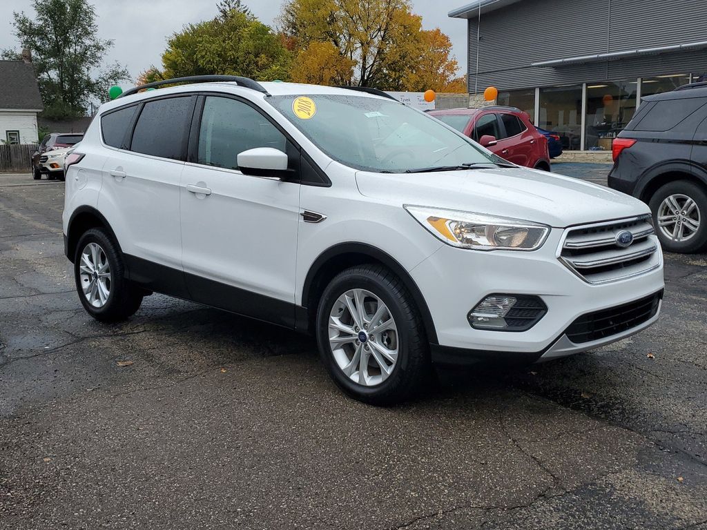 Used 2018 Ford Escape SE with VIN 1FMCU9GD8JUD23569 for sale in Paw Paw, MI