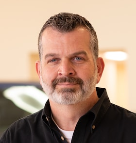 Staff member Andrew Isbell from ID_843f98a94995