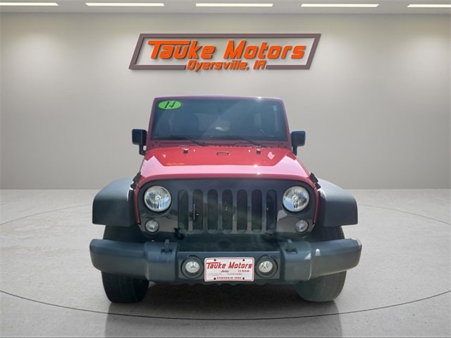 Used 2014 Jeep Wrangler Unlimited Willys Wheeler with VIN 1C4BJWDG7EL301662 for sale in Dyersville, IA