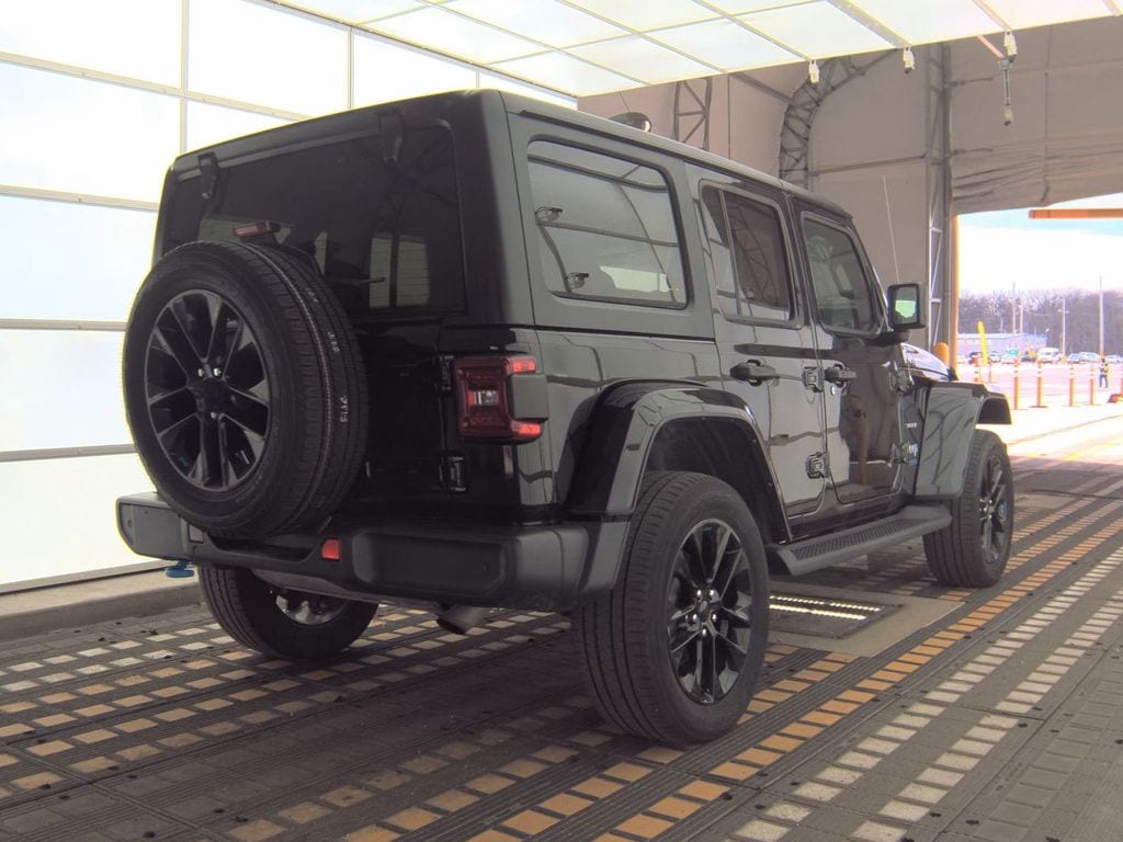 Used 2022 Jeep Wrangler Unlimited Sahara 4XE with VIN 1C4JJXP63NW264161 for sale in Plantation, FL