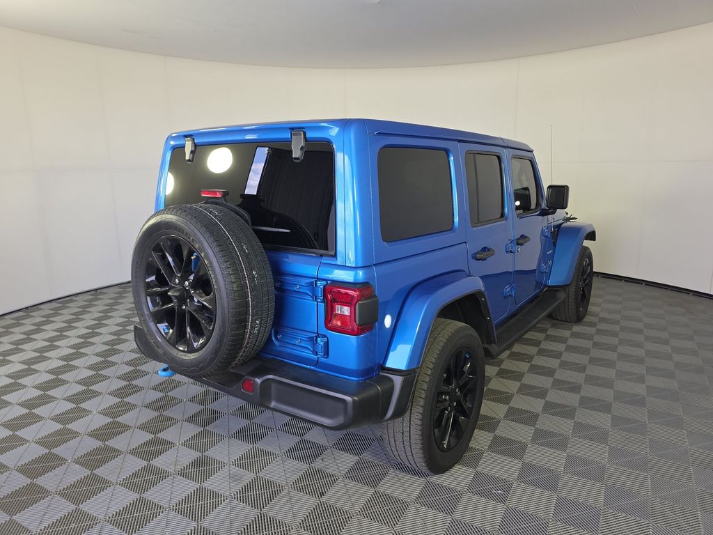 Used 2022 Jeep Wrangler Unlimited Sahara 4XE with VIN 1C4JJXP65NW137119 for sale in Plantation, FL