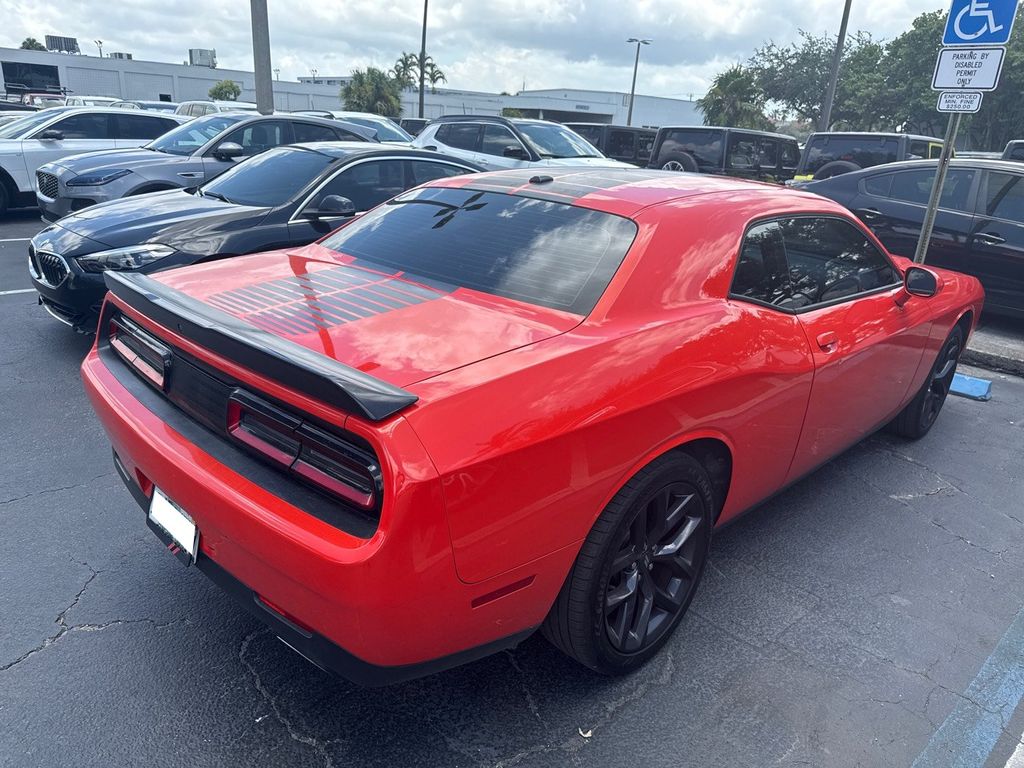 Used 2021 Dodge Challenger SXT with VIN 2C3CDZAG1MH571309 for sale in Plantation, FL