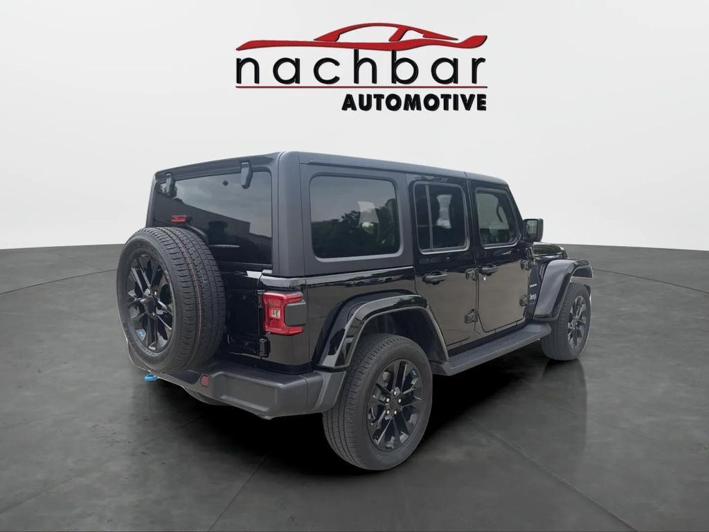 Used 2022 Jeep Wrangler Unlimited Sahara 4XE with VIN 1C4JJXP6XNW171461 for sale in Plantation, FL