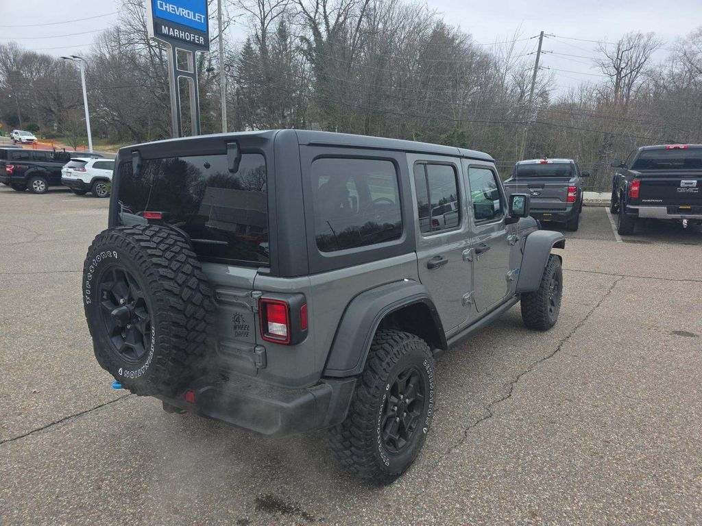 Used 2023 Jeep Wrangler 4xe Willys 4XE with VIN 1C4JJXN62PW604972 for sale in Plantation, FL