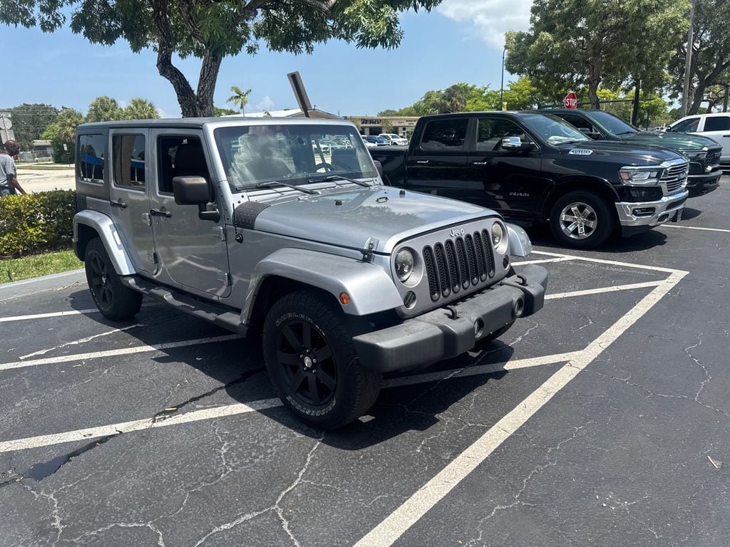 Used 2013 Jeep Wrangler Unlimited Sahara SUV