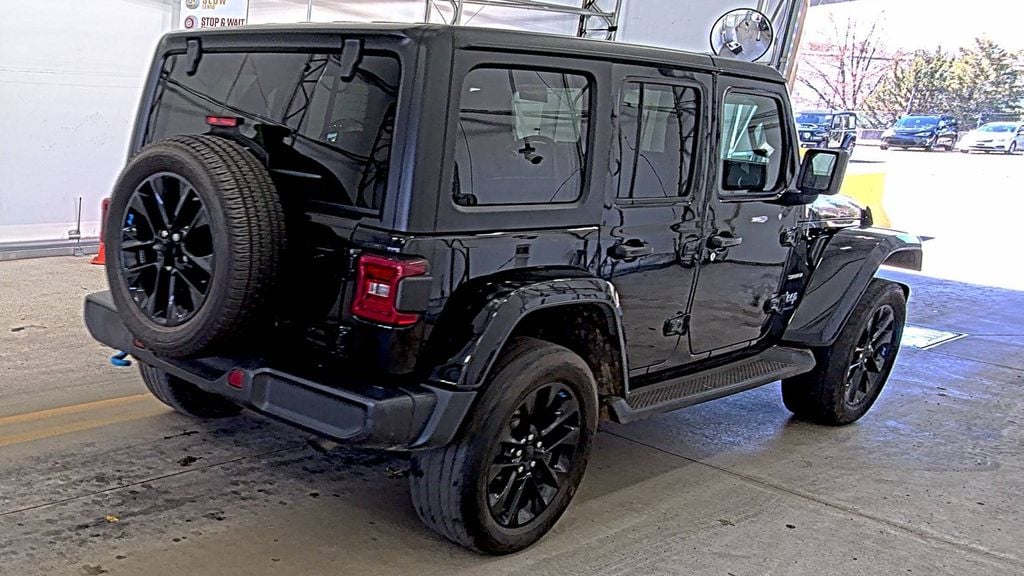 Used 2023 Jeep Wrangler 4xe Sahara 4XE with VIN 1C4JJXP68PW651193 for sale in Plantation, FL