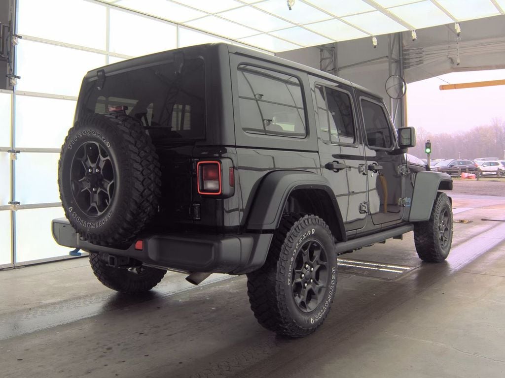 Used 2023 Jeep Wrangler 4xe Willys 4XE with VIN 1C4JJXN64PW683836 for sale in Plantation, FL