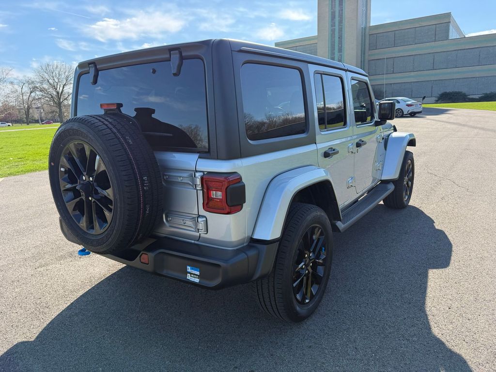 Used 2022 Jeep Wrangler Unlimited Sahara 4XE with VIN 1C4JJXP6XNW275027 for sale in Plantation, FL