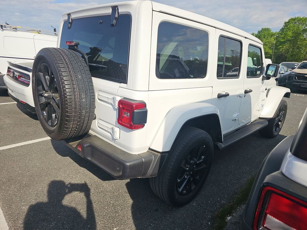 Used 2021 Jeep Wrangler Unlimited Sahara 4XE with VIN 1C4JJXP68MW676882 for sale in Pompano Beach, FL