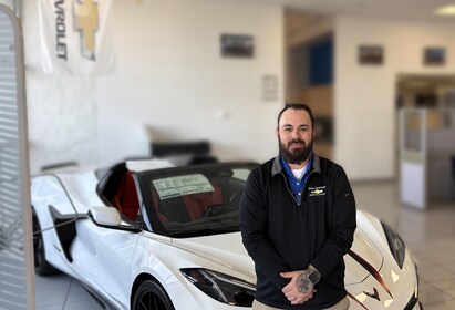 Staff member EVAN POSLUSZNY from ID_63aca6e476d7