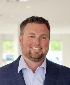 Staff member TAYLOR GRUBAUGH from ID_e91e10939835
