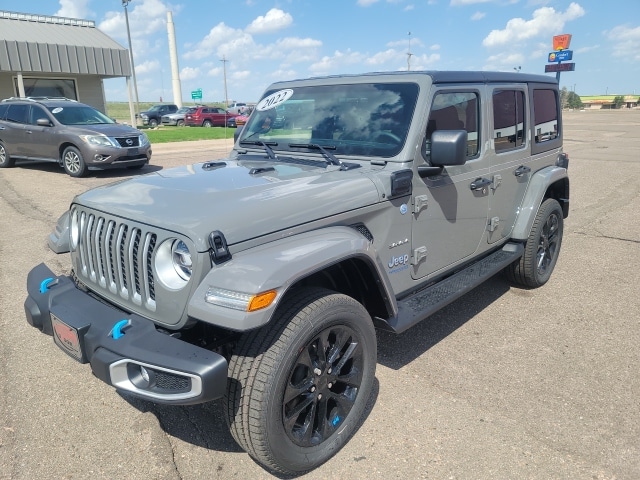 Certified 2022 Jeep Wrangler Unlimited Sahara 4XE with VIN 1C4JJXP6XNW114726 for sale in Colby, KS