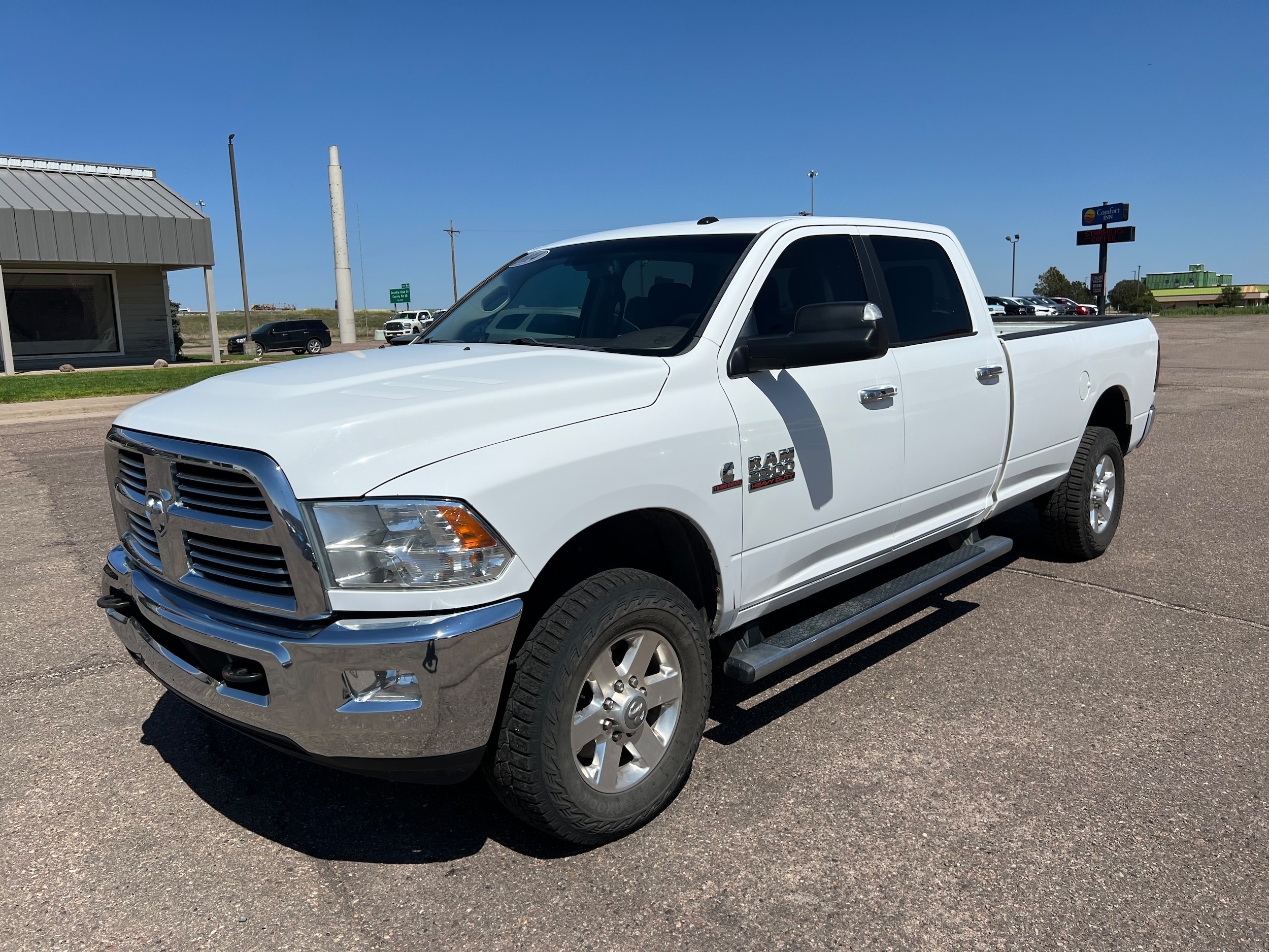 Used 2014 RAM Ram 2500 Pickup SLT with VIN 3C6UR5JL8EG225130 for sale in Colby, KS