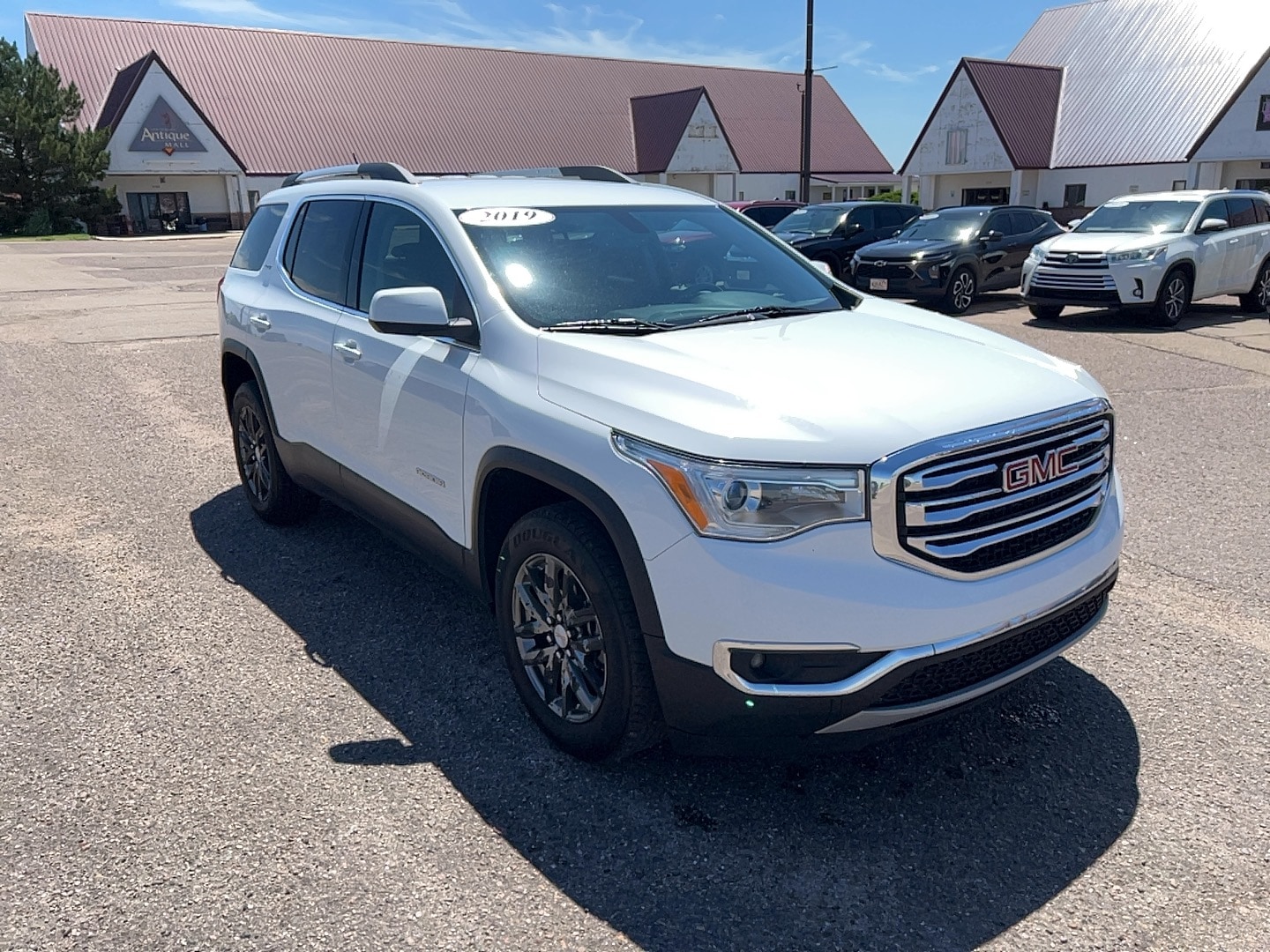 Used 2019 GMC Acadia SLT-1 with VIN 1GKKNULS8KZ180930 for sale in Colby, KS