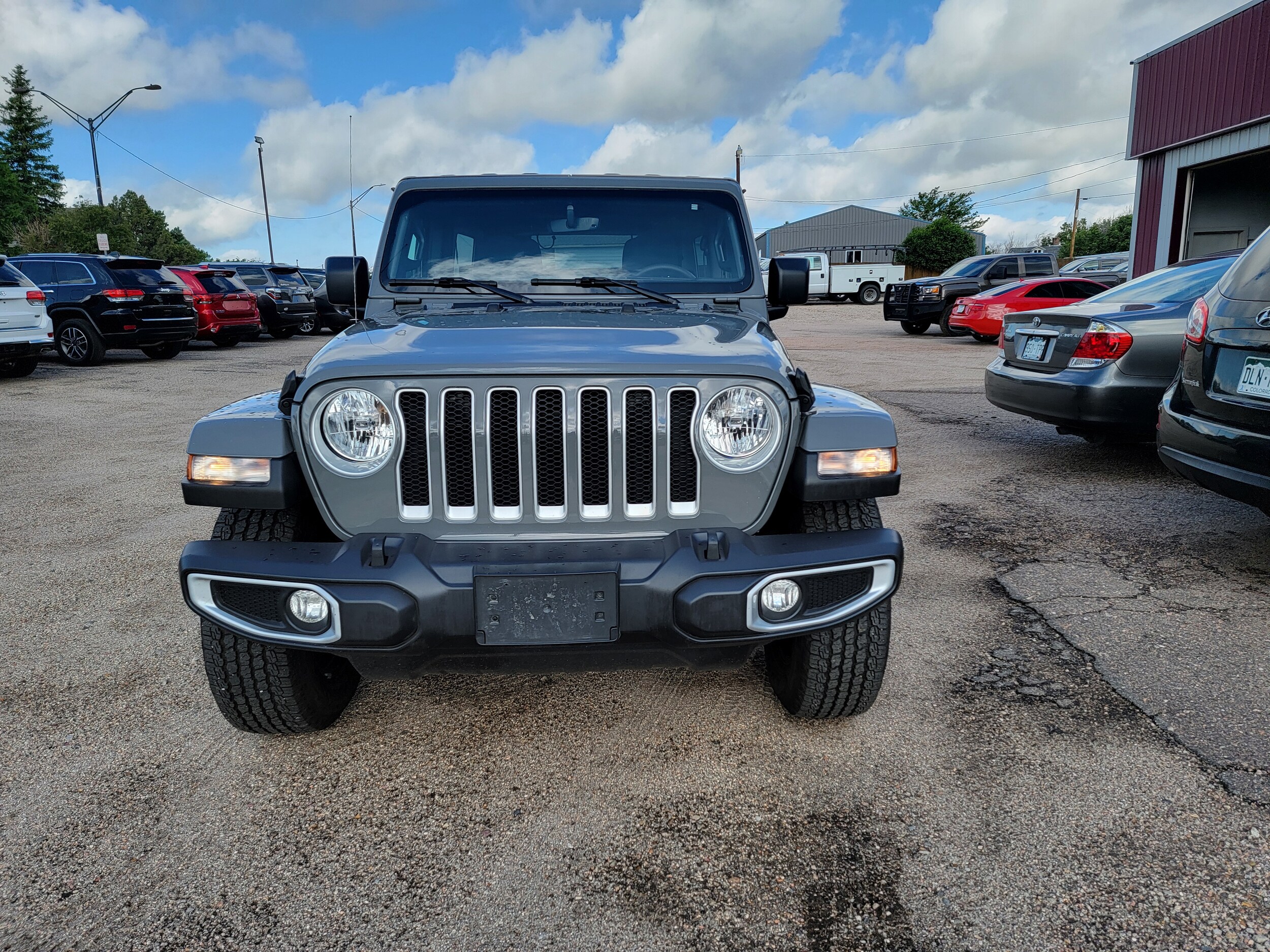 Used 2023 Jeep Wrangler 4-Door Sahara with VIN 1C4HJXEG3PW673449 for sale in Colby, KS