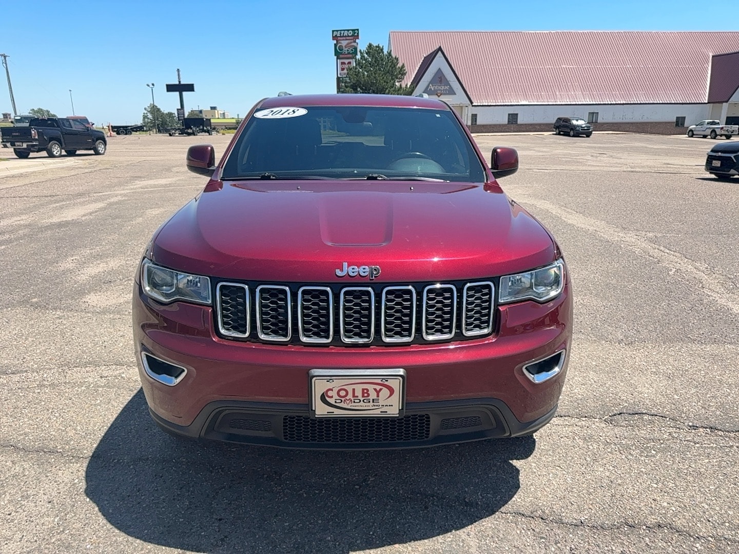 Used 2018 Jeep Grand Cherokee Laredo E with VIN 1C4RJFAG2JC207217 for sale in Colby, KS