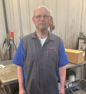 Staff member Larry Feasel from ad4b6978c594