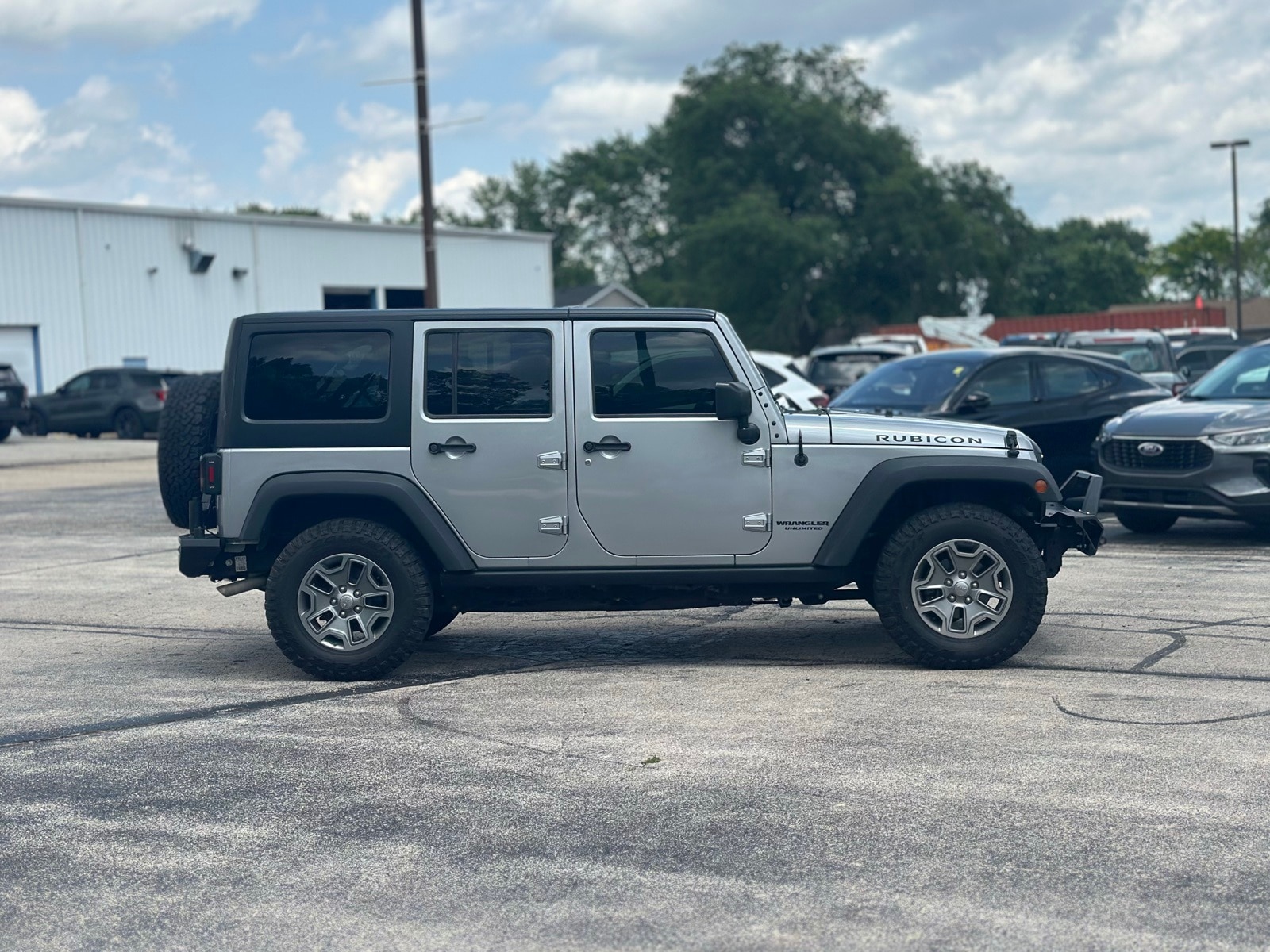Used 2016 Jeep Wrangler Unlimited Rubicon with VIN 1C4BJWFG0GL242003 for sale in Manteno, IL