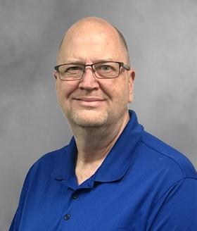 Staff member Richard Cox from ID_8a736d46d3d8