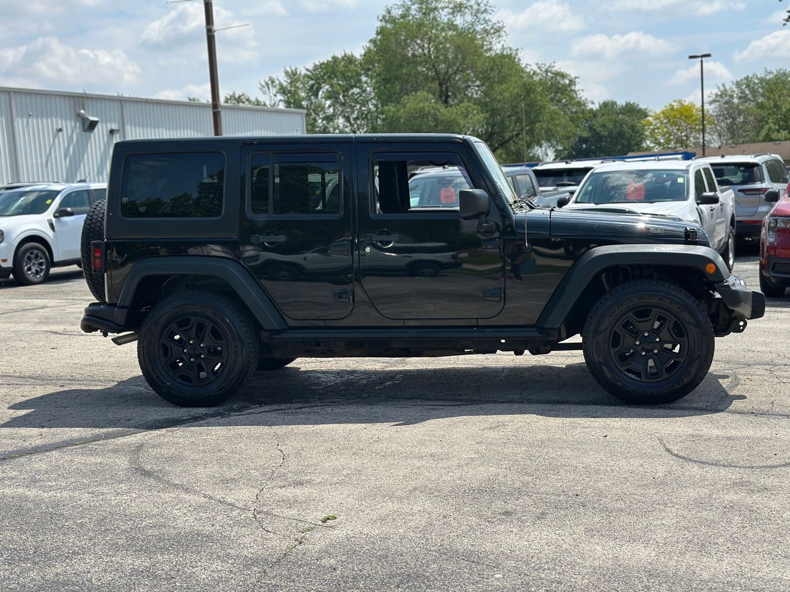Used 2013 Jeep Wrangler Unlimited Sahara with VIN 1C4BJWEG0DL596410 for sale in Manteno, IL