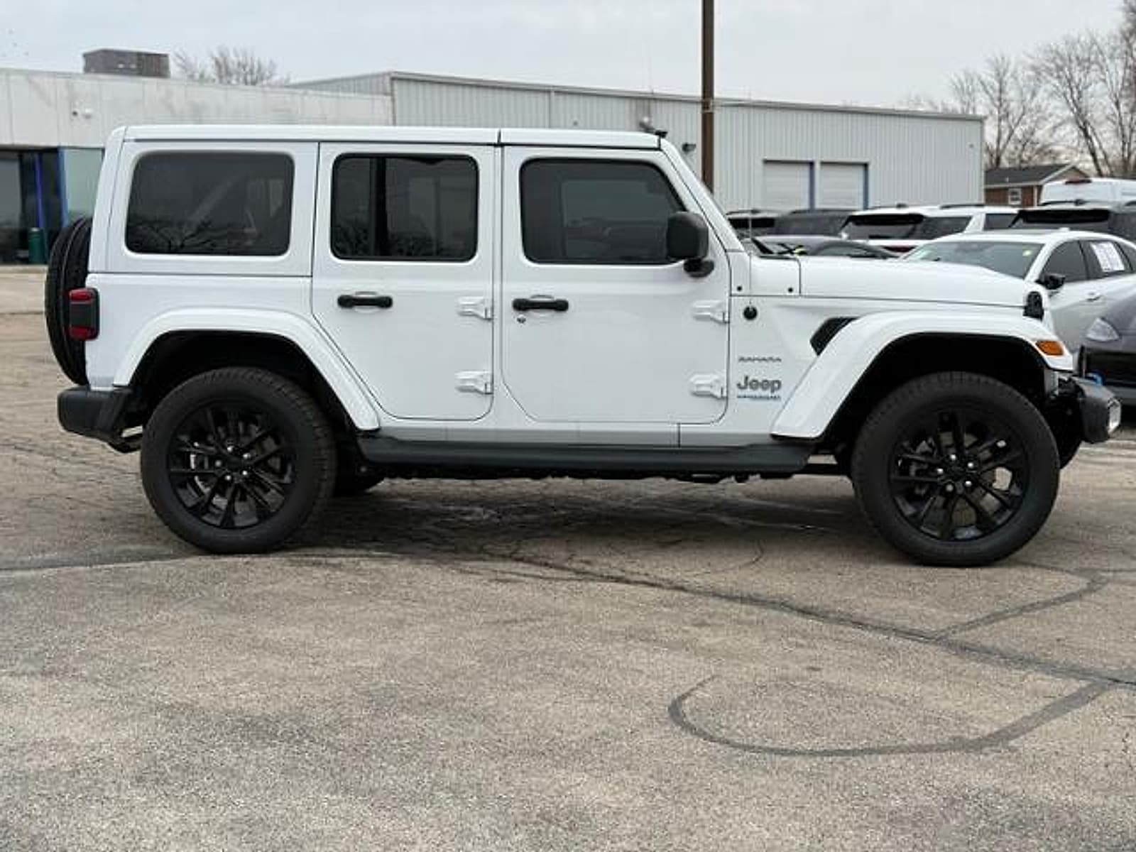 Used 2022 Jeep Wrangler Unlimited Sahara 4XE with VIN 1C4JJXP64NW123504 for sale in Manteno, IL