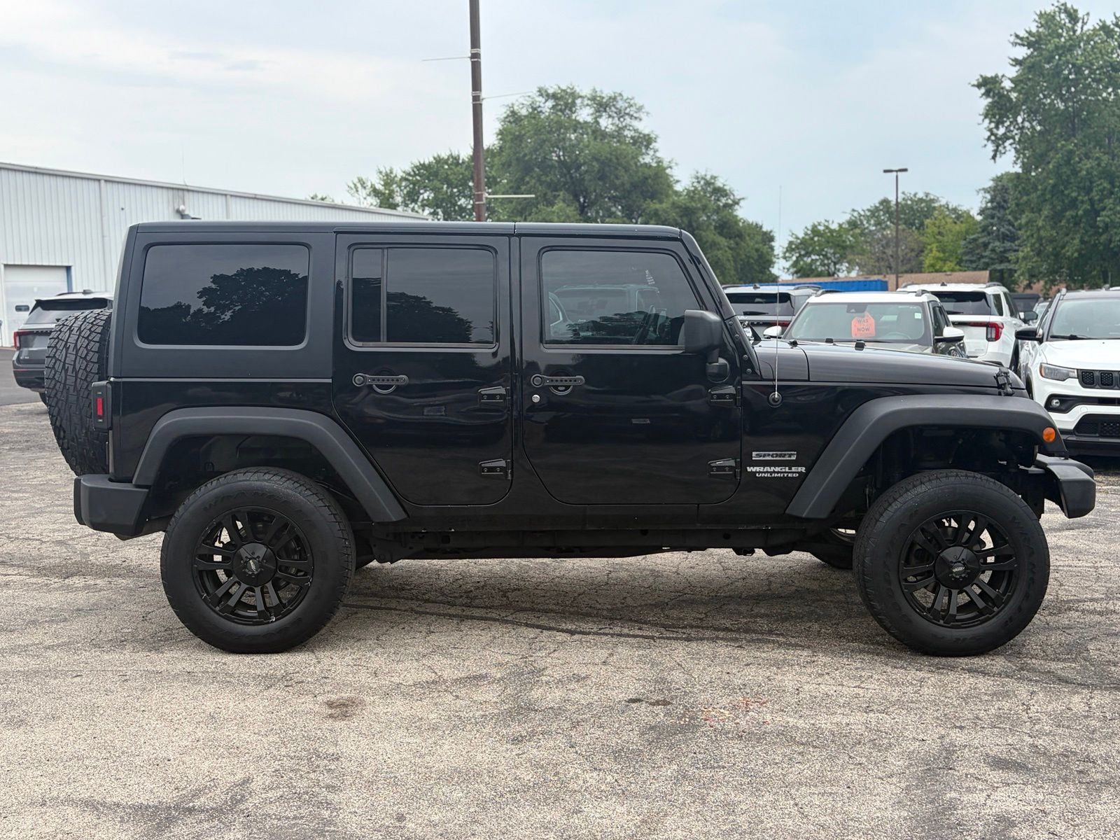 Used 2015 Jeep Wrangler Unlimited Sport with VIN 1C4HJWDG2FL572205 for sale in Manteno, IL