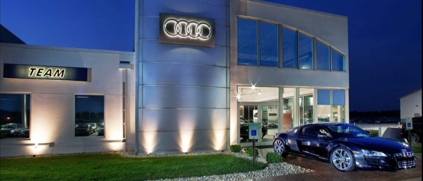 Front of Team Audi Dealership at Night