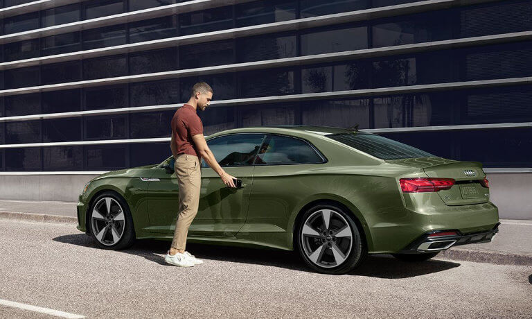 2022 Audi A5 Coupe exterior parked attended by a driver
