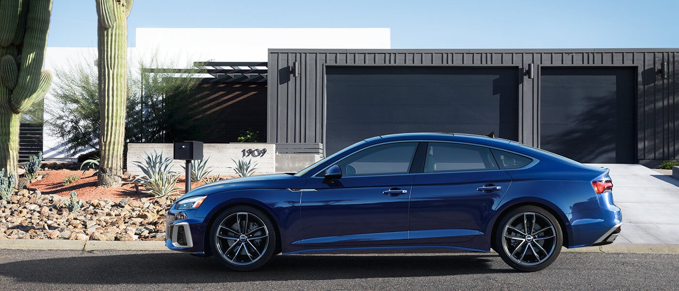 2024 Audi A5 Sportback Exterior Parked In Front Of Desert Home