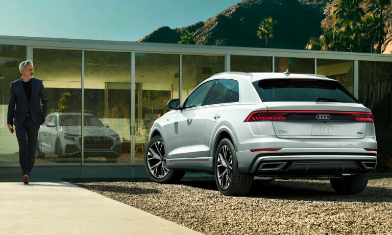 2022 Audi Q8 SUV parked by owner in modern real estate