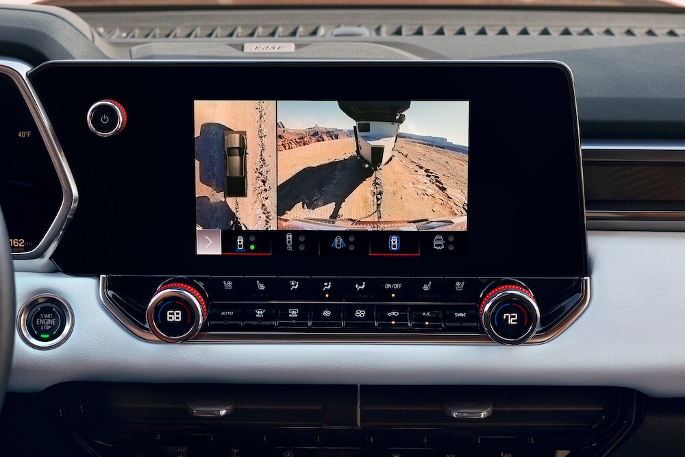  Person cheerfully signing documents.