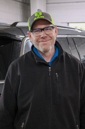 Staff member Stewart Conn from ID_3abe7e126bf4