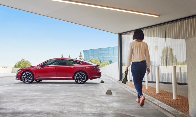 2022 VW Arteon Exterior Parked Outside Building With Woman Walking