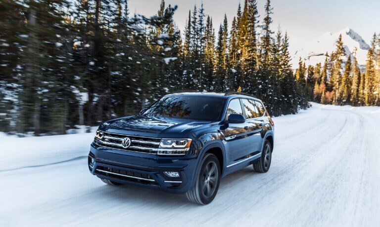2020 Volkswagen Atlas Exterior Front View Driving On A Snowy Forested Road
