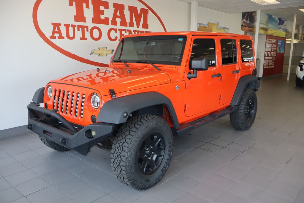 Used 2015 Jeep Wrangler Unlimited Sahara with VIN 1C4BJWEGXFL627942 for sale in Scottsbluff, NE