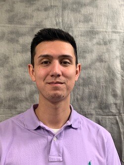 Staff member Zach Elhormaoui from a54e3d9aaa92