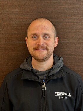 Staff member Justin Miles from ID_a370e76cc76c