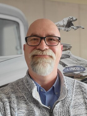 Staff member TOBIAS QUEEN from ID_19640d7123ba