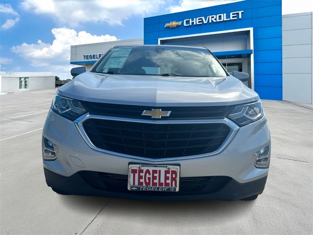 Used 2021 Chevrolet Equinox LT with VIN 3GNAXKEV7MS141220 for sale in Sealy, TX