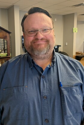 Staff member Mark Mills from ID_30689af84421