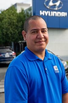 Staff member Carlos Velasco from 9a2bccbc6055