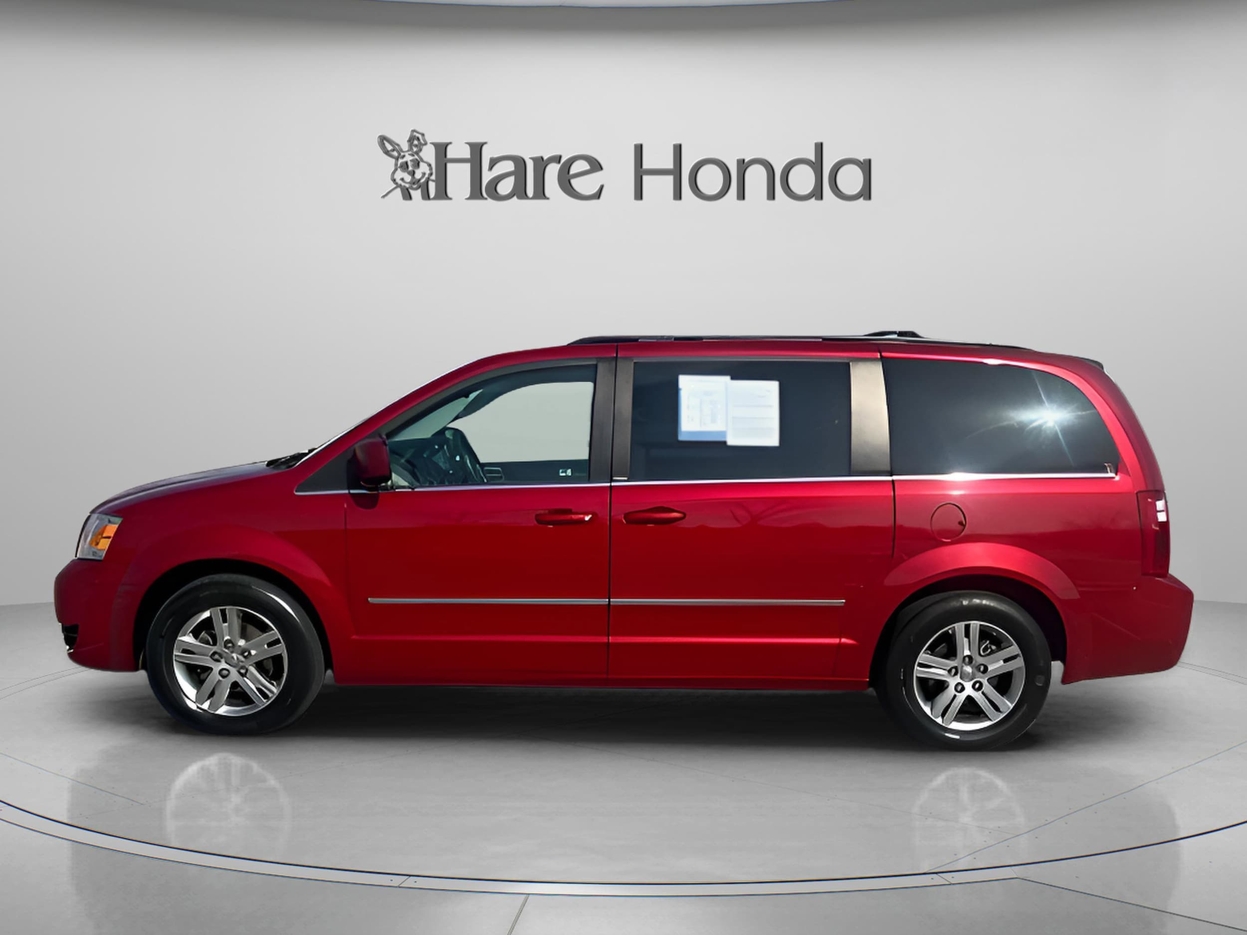 Used 2010 Dodge Grand Caravan SXT with VIN 2D4RN5DX4AR216960 for sale in Avon, IN