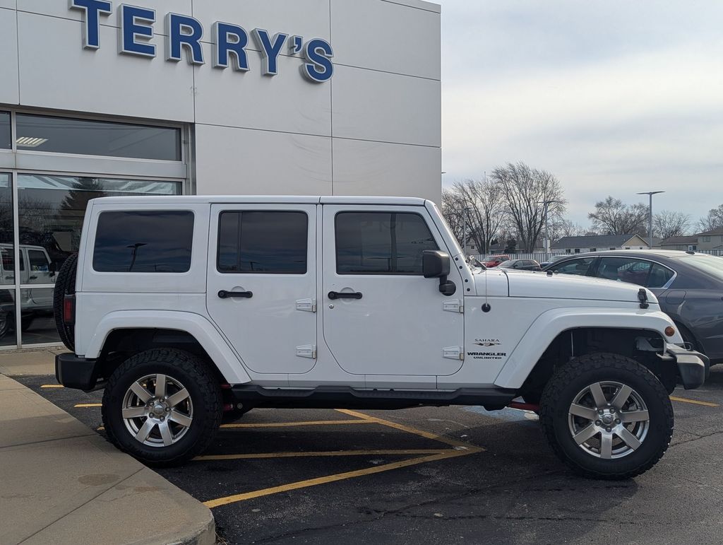 Used 2017 Jeep Wrangler Unlimited Sahara with VIN 1C4HJWEG5HL667987 for sale in Peotone, IL