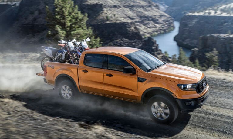 2020 Ford Ranger exterior towing dirtbikes on canyon road