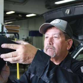 Staff member John Courier from 4f30167b0c12