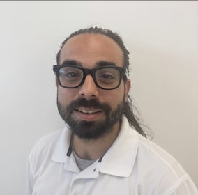 Staff member Rolando Benitez from ID_5eb955