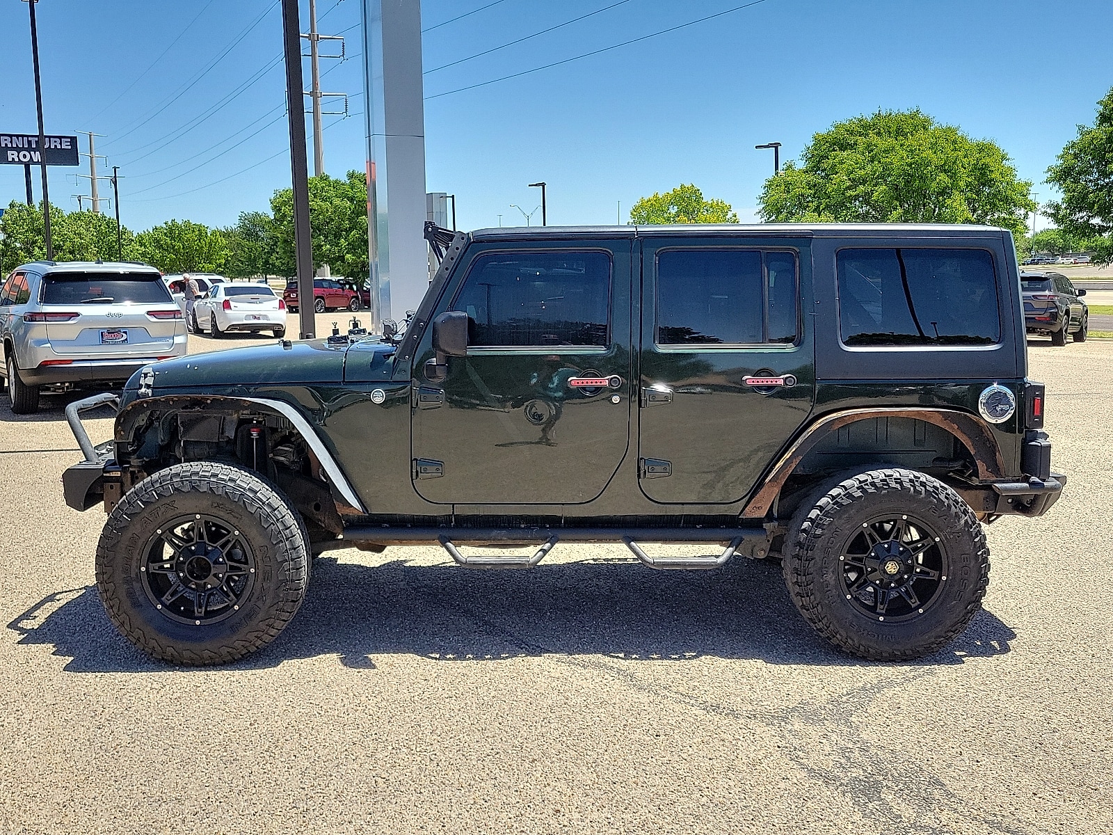 Used 2011 Jeep Wrangler Unlimited Sahara with VIN 1J4HA5H19BL532515 for sale in Amarillo, TX