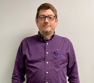 Staff member Mark Irving from ID_e6199d27d268