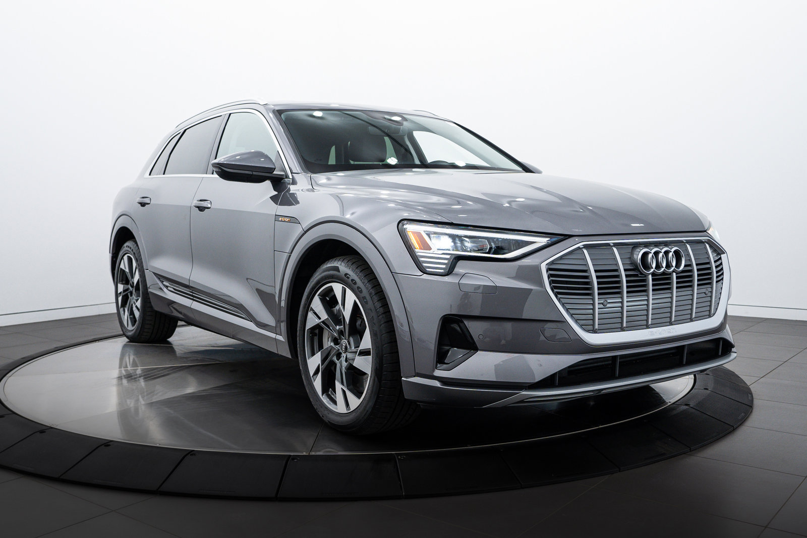 Used 2021 Audi e-tron Premium with VIN WA1AAAGE9MB023855 for sale in Highland Park, IL