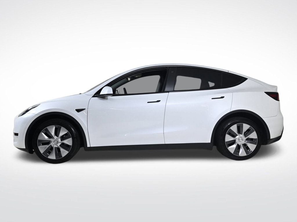 Used 2022 Tesla Model Y Long Range with VIN 7SAYGDEE3NF430272 for sale in Coral Gables, FL